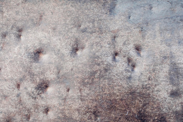 Old rusty with dented metal texture background. Shabby metal surface