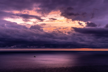 Dramatic panoramic view of the sea and moody cloudy sky