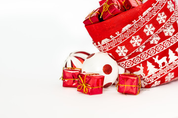 New Year, Christmas, Christmas balls in a bag, balls, gift boxes, close-up, isolated on a white background.