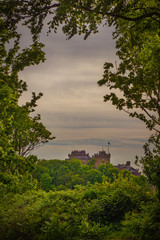 Fototapeta na wymiar View of Culzean Castle in Scotland Framed by Trees in the Foreground