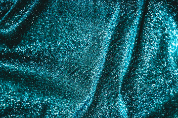 Emerald holiday sparkling glitter abstract background, luxury shiny fabric material for glamour...