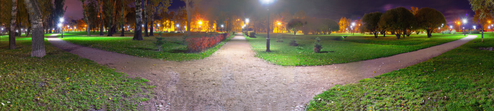 Fork Of Three Roads At Night. Choosing A Path In The Suburb Square.