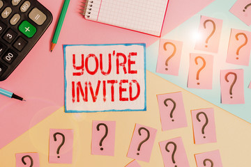 Writing note showing You Re Invited. Business concept for Please join us in our celebration Welcome Be a guest Mathematics stuff and writing equipment above pastel colours background