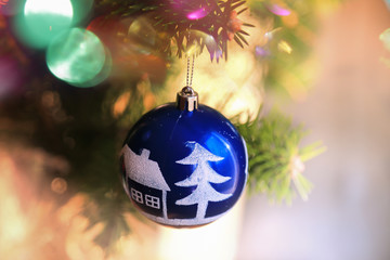 Christmas ball on tree branch