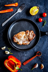 concept cooked steak on dark background top view