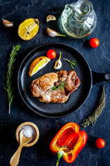 concept cooked steak on dark background top view