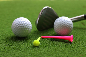 Golf equipment in beautiful golf course at sunset background.