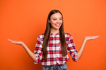 Photo portrait of satisfied delightful optimistic lady holding invisible transparent products...