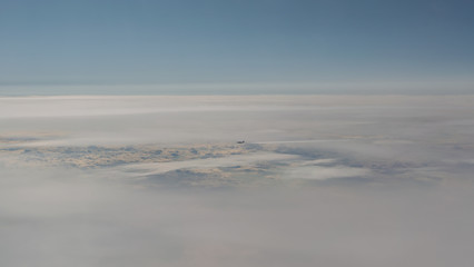 Luftaufnahme von Wolkenfeldern über den Wolken