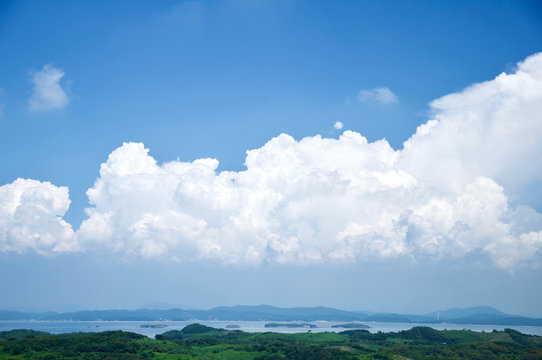 A Cloud Of Clouds Rising Over The Seaside Village, Taean County, Korea