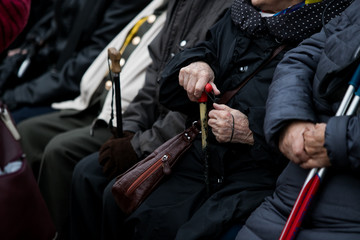 Fototapeta na wymiar senior citizens sitting on a bench russia