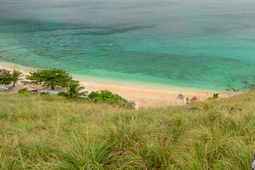 Green ocean water with beach ,Sambawan