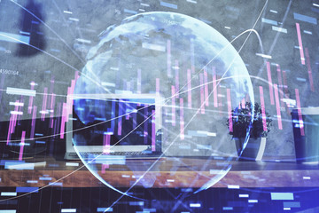 Multi exposure of chart and financial info and work space with computer background. Concept of international online trading.