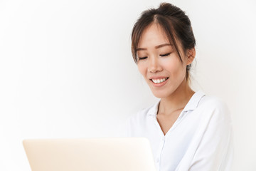 Attractive smiling young asian woman