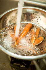 Several peeled carrots close up