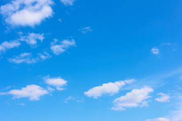 Naklejka na ściany i meble Blue sky with light white clouds - background