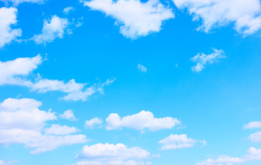 Light blue sky with white clouds -  background