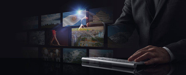 Businessman working on screen with Argentina