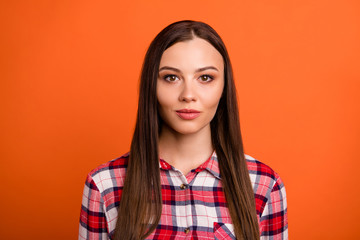 Close-up portrait of her she nice-looking attractive lovely winsome peaceful content straight-haired girl wearing checked shirt isolated over bright vivid shine vibrant orange color background