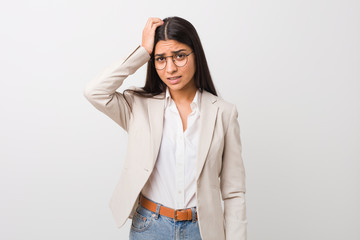 Fototapeta premium Young business arab woman isolated against a white background being shocked, she has remembered important meeting.