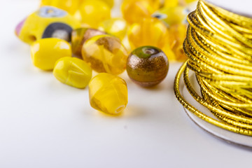 Glass beads and gold cord
