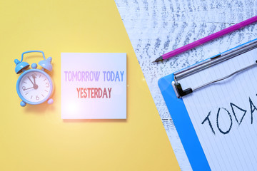 Writing note showing Tomorrow Today Yesterday. Business concept for Adverbs of Time tells us when a...