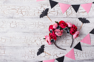 Halloween wreath with pink flowers