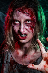 Scary undead zombie. Halloween make-up and costume