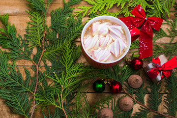 coffee with marshmallows in the red cup. Christmas and new year mood
