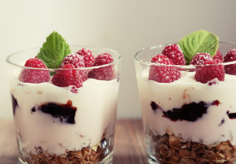 Natural yogurt with fresh berries and muesli. Healthy dessert.