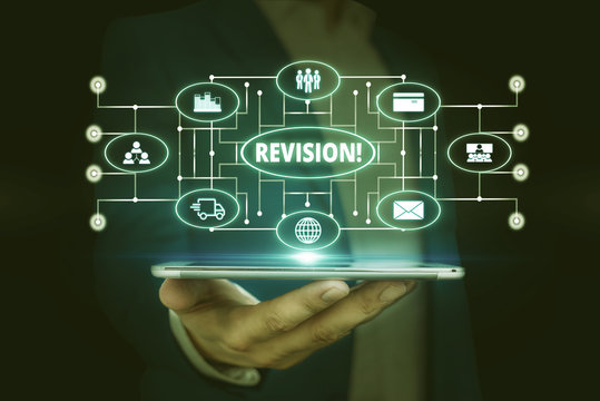 Word writing text Revision. Business photo showcasing action of revising over someone like auditing or accounting Male human wear formal work suit presenting presentation using smart device