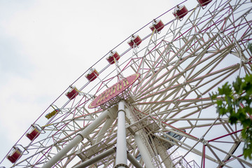 High ferris wheel on a bright, summer, sunny day.