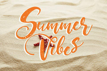 red starfish on sand with summer vibes lettering