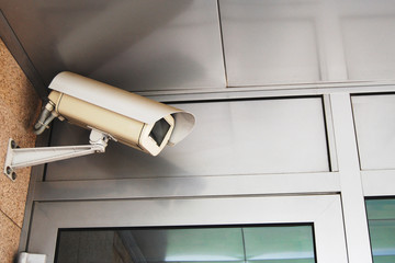 Surveillance camera at bank office entrance 