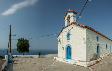Fototapeta na wymiar Picturesque Church of the Little Village Makriloggos near Methana, Greece