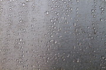 Raindrops on stell wall detail