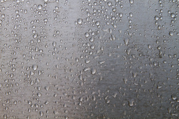 Raindrops on stell wall detail