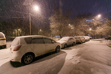 Fototapeta na wymiar Highways in the mountain of Vladivostok during a snowfall. Road traffic.