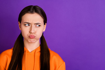 Close-up portrait of her she nice attractive moody offended bored girl with pigtails blowing cheeks...