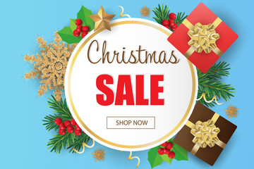 Merry Christmas and Happy New Year. Christmas sale banner in blue background with gift boxes, Christmas tree branches and decoration.