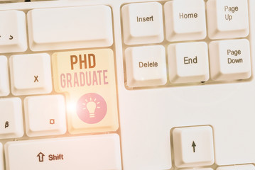Word writing text Phd Graduate. Business photo showcasing highest university degree that is...