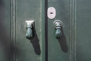 Vintage doorknob shaped like hands