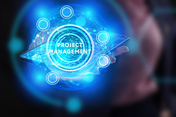 Obraz premium The concept of business, technology, the Internet and the network. A young entrepreneur working on a virtual screen of the future and sees the inscription: