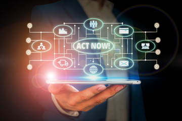 Word writing text Act Now. Business photo showcasing fulfil the function or serve the purpose of Take action Do something Male human wear formal work suit presenting presentation using smart device