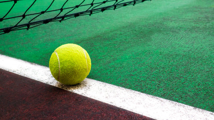 Tennis court with tennis ball close up, sport background
