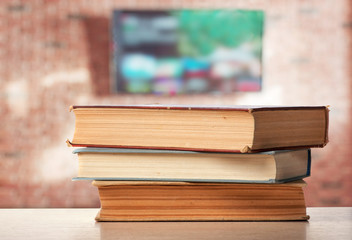 Stack of books on the table in the living room