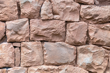 Natural stone abstract background wall made by ancient Inca of Peru in South America. Background with copy space