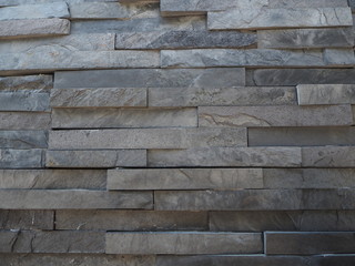 Modern brick wall. Wall Rocks. Stone wall texture background natural color.