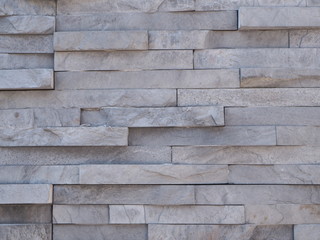 Fototapeta premium Modern brick wall. Wall Rocks. Stone wall texture background natural color.