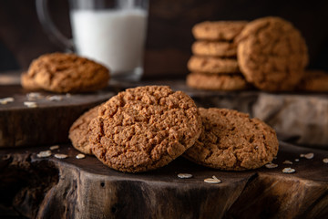 Biscuit with berry or fruit filling. Crispy and crumbly delicious cookies with natural ingredients: flour, nuts, seeds, pieces of chocolate, cocoa, fruit jams.   Stylish still life for poster.